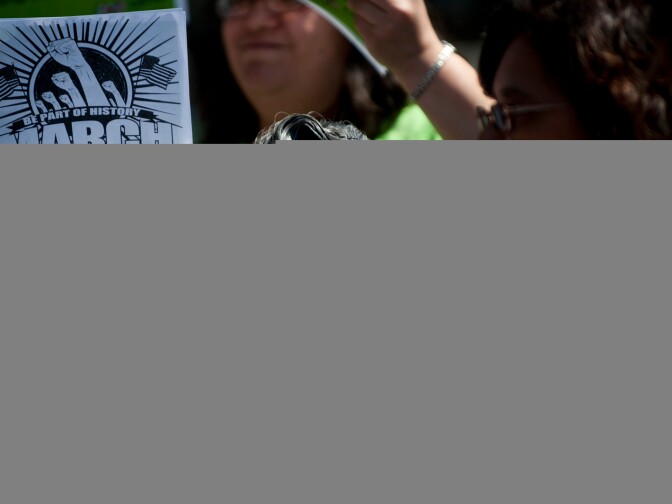 Maria Montezuma waits at the Westwood Recreation Center, at the start of Wednesday's march down Sepulveda Boulevard. Hundreds of immigration reform supporters took part in a march on Wednesday to Senator Diane Feinstein's LA office. The march coincides with a immigration reform rally in Washington D.C.