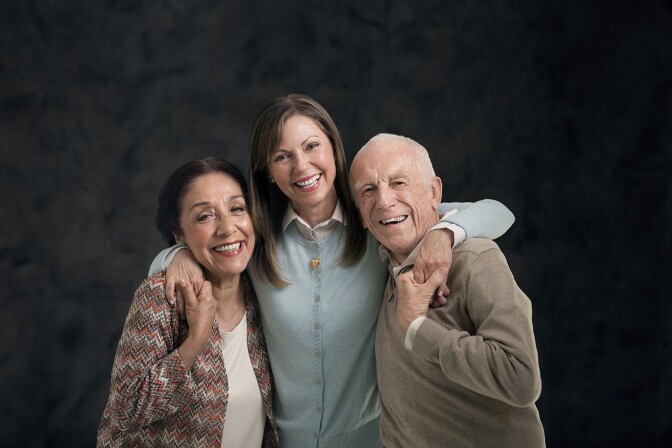A photo from AARP and the Ad Council is part of a new set of public service announcements to connect caregivers with resources and support, particularly those in the Latino community.
