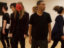 At a rehearsal ahead of the Wallis Youth Theater Company's first performance, the cast spins away from the masked "Trickster,' a demagogue who uses words to divide.