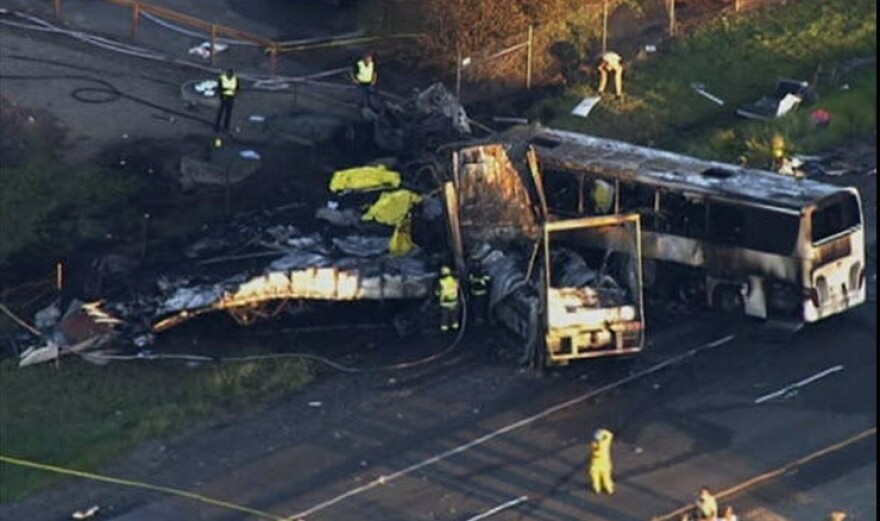A screencap from NBC-LA of wreckage from a bus crash on Interstate 5 in Northern California that killed 9 on April 10, 2014.