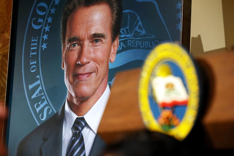 The official gubernatorial portrait of former California Gov. Arnold Schwarzenegger is displayed in the Rotunda of the State Capitol following an unveiling ceremony September 8, 2014 in Sacramento, California. Former California Gov. Arnold Schwarzenegger was joined by current Gov. Jerry Brown to unveil his official gubernatorial portrait at the State Capitol. 