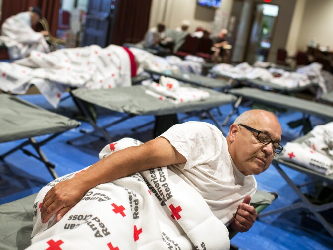 Dan Sermeno of Duarte stayed last night at an evacuation center inside the Duarte Community Center during the San Gabriel Complex fire. Sermeno's home is in Maddock Canyon. He hopes that he can return to his home tonight.