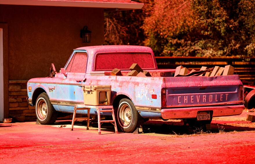 A truck covered in red.