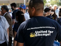 Inland Empire warehouse workers and supporters stage rally in downtown San Bernardino to protest their working conditions.
