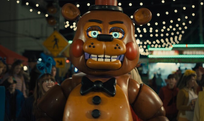 A giant animatronic bear at a carnival