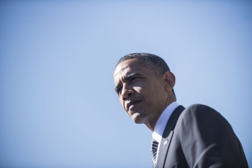 US President Barack Obama pauses while speaking at the establishment of the Chavez National Monument October 8, 2012 in Keene, California. Obama is on a three day trip where he will campaign in California and Ohio as well as attend the establishment of the Cesar E. Chavez National Monument.