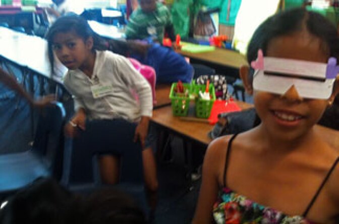 Third grader Karen Quezada (R) is one of about 10,000 Santa Ana Unified students signed up for the district's summer enrichment program.