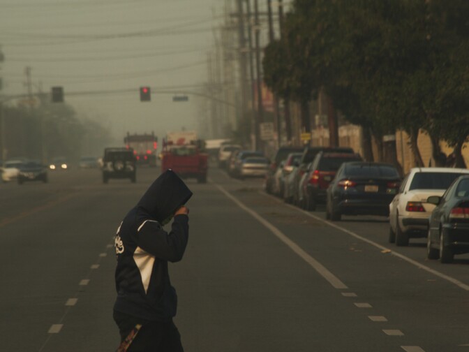 Thick smoke from the Creek Fire reduced visibility and made it difficult to breathe in downtown Sylmar on Dec. 5, 2017.