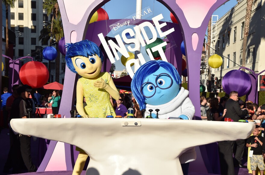 HOLLYWOOD, CA - JUNE 08:  Film characters Joy and Sadness attend the Los Angeles premiere of Disney-Pixar's "Inside Out" at the El Capitan Theatre on June 8, 2015 in Hollywood, California.  (Photo by Kevin Winter/Getty Images)