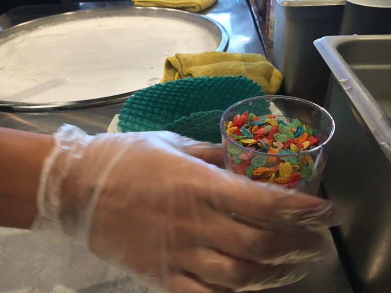Kenny Tran prepares to create his masterpiece