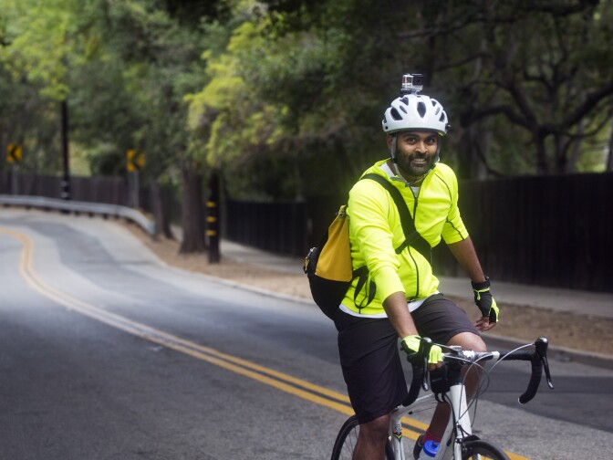 Tushar Thrivikraman bikes on South Arroyo Boulevard in Pasadena on Thursday morning, July 9, 2015 during a bike train commute to Jet Propulsion Laboratory.