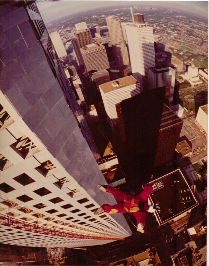 Carl Boenish diving down into a cityscape. For him, filming the jumps was just as important as the activity.
