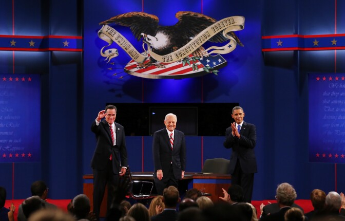 BOCA RATON, FL - OCTOBER 22:  U.S. President Barack Obama (R) stands on stage with Republican presidential candidate Mitt Romney (L) and moderator Bob Schieffer of CBS at the Keith C. and Elaine Johnson Wold Performing Arts Center at Lynn University on October 22, 2012 in Boca Raton, Florida. The focus for the final presidential debate before Election Day on November 6 is foreign policy.  (Photo by Joe Raedle/Getty Images)