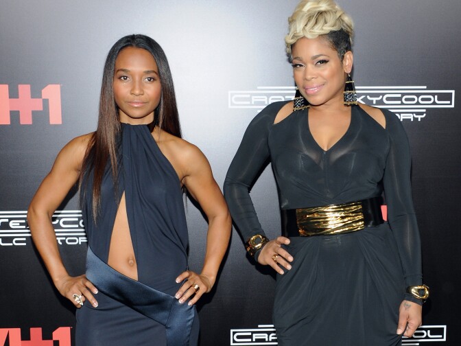 TLC's Chilli and T-Boz attend the New York premiere of <em>CrazySexyCool</em> on Oct. 15, 2013.