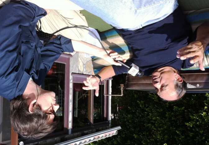 Cheech Marin (left) with Off-Ramp host John Rabe, talking about Chicano art at Marin's Malibu Cheech house.