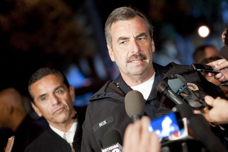 File: Los Angeles Police Department Chief Charlie Beck talks to members of the media in front of City Hall in downtown in the early hours of November 30, 2011 in Los Angeles.