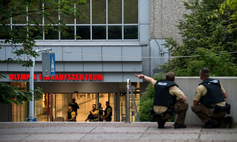 Police officers respond to a shooting at the Olympia Einkaufzentrum (OEZ) at July 22, 2016 in Munich, Germany.  According to reports, several people have been killed and an unknown number injured in a shooting at a shopping centre in the north-western Moosach district in Munich. Police are hunting the attacker or attackers who are thought to be still at large.