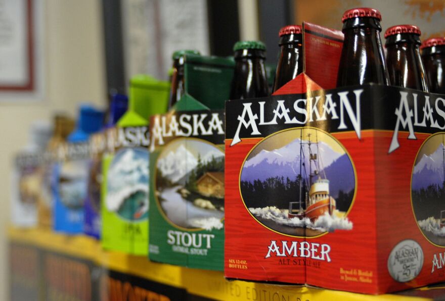 In this photo taken Jan 23, 2013, in Juneau, Alaska, are six-packs of beer displayed at the Alaskan Brewing Co. The brewery has installed a unique boiler system that burns the company's spent grain the accumulated waste from the brewing process into steam which powers the majority of the plant's operations.  