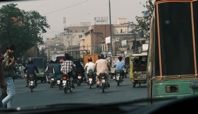 A film photograph of a busy street in Pakistan taken by one of our staff members.