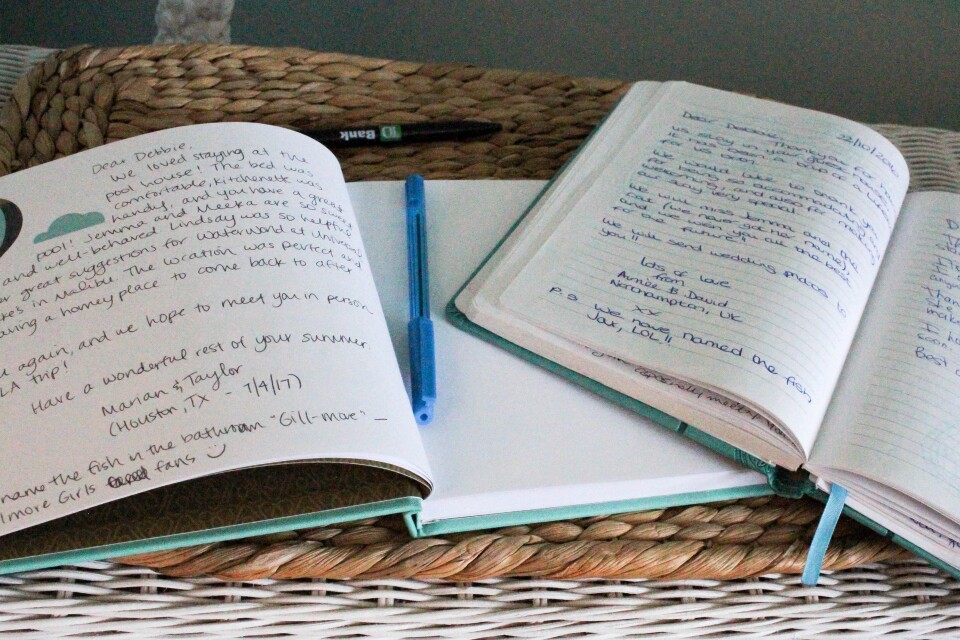 Debbie Pollack hosts many guests who leave friendly notes in her guest book at her home in Sherman Oaks, California on July 10, 2017.