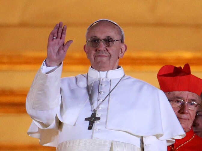 Newly elected Pope Francis I appears on the central balcony of St Peter's Basilica on March 13, 2013 in Vatican City, Vatican. Argentinian Cardinal Jorge Mario Bergoglio was elected as the 266th Pontiff and will lead the world's 1.2 billion Catholics.