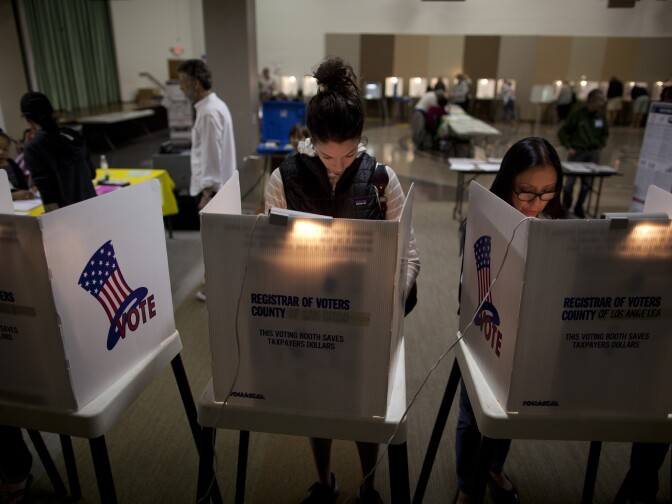 Voters take to the polls at the First Methodist Church in Santa Monica to cast their vote in the 2014 mid-term election.