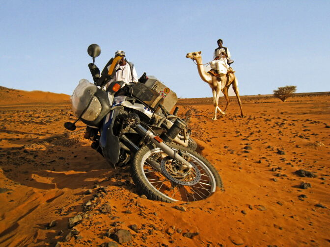 Allan Karl is slowed down by sand as he heads north from Khartoum to Wadi Halfa in Eastern Sudan, along the route of the Nile River. T 