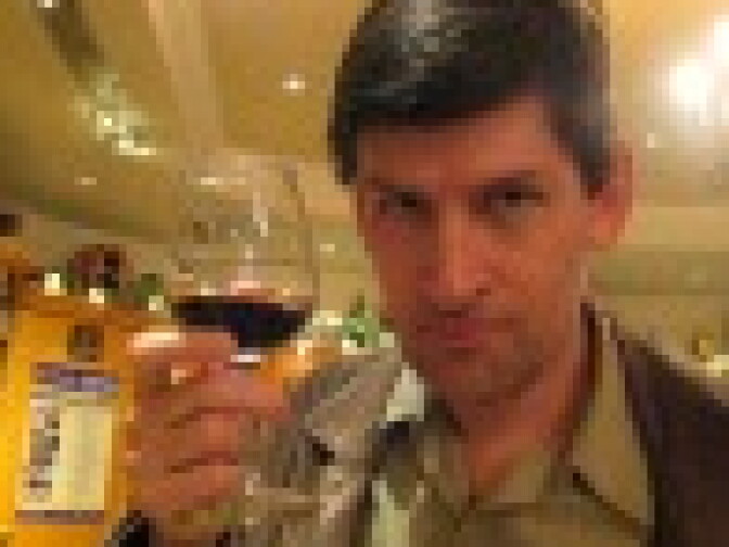Rabe with wineglass