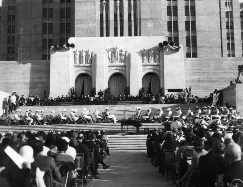A black and white photo shows hundreds of people attending an opening Ceremony for LA County General Hospital in 1933.
