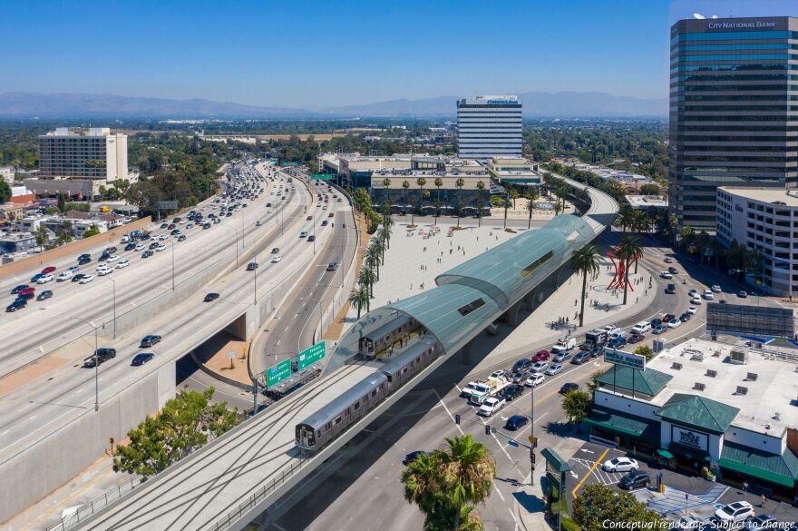 A digital rendering shows an idea for a rail station above street traffic, with a freeway running in the background.