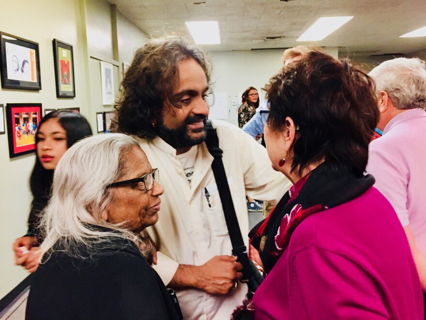 Director Shishir Kurup greets audience members after the show alongside his biggest fan, his mother, Leela, who raised him in Kenya.