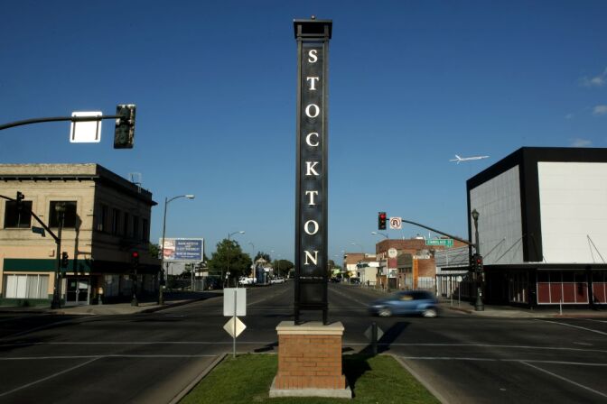 A sign is seen in a deserted section of downtown Stockton, Calif. On Monday, the state's 13th-largest city begins federal court proceedings that could end with it becoming the most populous in the nation to successfully enter Chapter 9 bankruptcy, a move opposed by those who lent the money to keep it flush. (Photo by Justin Sullivan/Getty Images)