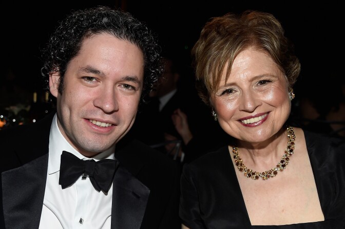 HOLLYWOOD, CA - JUNE 09:  Conductor Gustavo Dudamel (L) and President and CEO of the 
Los Angeles Philharmonic Deborah Borda pose in the audience during American Film Institutes 44th Life Achievement Award Gala Tribute to John Williams at Dolby Theatre on June 9, 2016 in Hollywood, California. 26148_001  (Photo by Frazer Harrison/Getty Images for Turner)