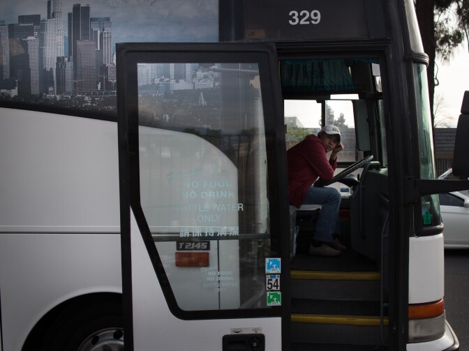 A casino bus driver waits for passengers in Rosemead. Buses usually charge 5 to 10 dollars for rides to casinos in Southern California.