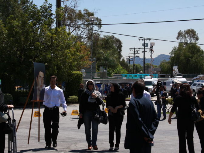 Family, friends and the news media outside Valhalla Memorial Park before Abdul Arian's funeral service.