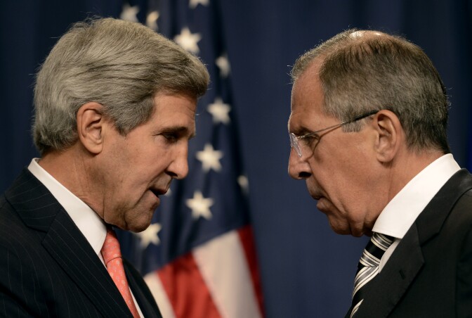 US Secretary of State John Kerry (L) speaks with Russian Foreign Minister Sergey Lavrov (R) before a press conference in Geneva on September 14, 2013 after they met for talks on Syria's chemical weapons. Washington and Moscow have agreed a deal to eliminate Syria's chemical weapons, Kerry said after talks with Lavrov.