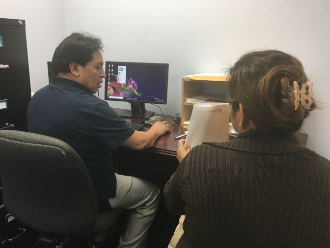 Dilcia Inestroza obtains help with her renewal application for Temporary Protected Status at El Rescate, a community organization and legal clinic just outside downtown Los Angeles. An immigrant from Honduras, she's had the protection for almost 20 years. The Trump administration has canceled TPS for immigrants from El Salvador, Haiti, Nicaragua and Sudan. Hondurans fear they could be next.