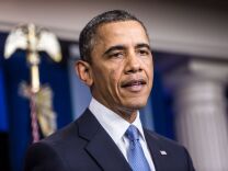 The U.S. Treasury said Friday that it took in a rare surplus of $113 billion in April, the largest in five years. Steady economic growth and higher tax rates have boosted the government's tax revenue, keeping this year's annual budget deficit on pace to be the smallest since 2008. (Photo: U.S. President Barack Obama makes a statement in the White House Briefing Room following passage by the House of tax legislation on January 1, 2013 in Washington, D.C. which averted the 'fiscal cliff.') 