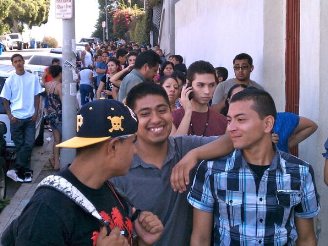 Close to 300 people wait in line to attend orientation classes on "deferred action" from the non-profit Coalition for Humane Immigrant Rights of Los Angeles, or CHIRLA, before doors open at 9.  The line ran down West Third, and bent around to South Coronado, and up a slope.  
