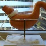 A Lap-Band is displayed on a mock up of a human stomach.