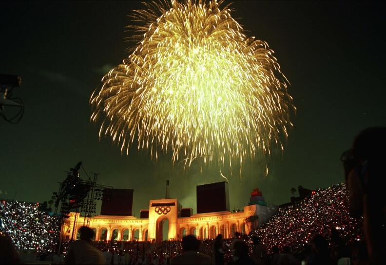 Fireworks light up the sky over the Los Angeles Memorial Coliseum during closing ceremonies of the Summer Olympics in this Aug. 12, 1984, file photo. 
