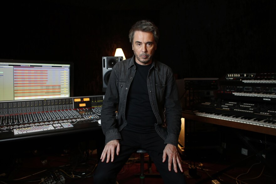 French composer, performer and music producer Jean-Michel Jarre poses at his recording studio in Bougival, west of Paris, on September 30, 2015. AFP PHOTO / THOMAS SAMSON        (Photo credit should read THOMAS SAMSON/AFP/Getty Images)