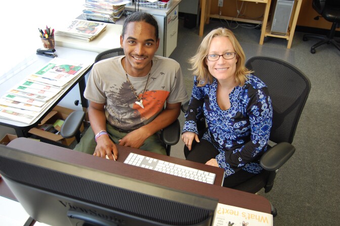 L.A. Youth co-managing editor Amanda Riddle, right, works with Charles Watkins, a teen in foster care, on his story about being grateful that he was adopted.
