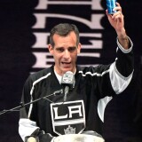 LOS ANGELES, CA - JUNE 16:  Los Angeles Kings Mayor Eric Garcetti raises a beer and swears during the Los Angeles Kings Victory Parade And Rally on June 16, 2014 in Los Angeles, California.  (Photo by Harry How/Getty Images)