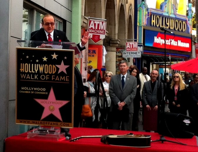 Legendary music executive Clive Davis speaking at the ceremony finally giving Janis Joplin a star on the Hollywood Walk of Fame. Joplin was the first artist Davis signed to Columbia Records. 
