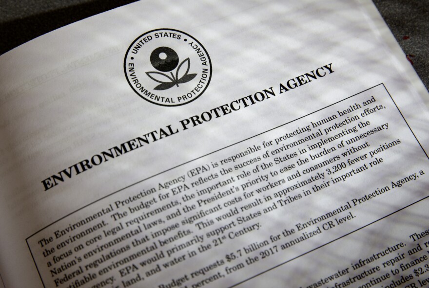 Proposals for the Environmental Protection Agency (EPA) in President Donald Trump's first budget are displayed at the Government Printing Office in Washington, Thursday, March, 16, 2017. The $1.15 trillion presentation proposes a reordering of national spending priorities, pumping significantly more money into the military and homeland security while sharply cutting foreign aid, medical research and the arts. The document also proposes money for the U.S.-Mexico border wall Trump vowed in his campaign to have Mexico finance. The EPA also takes a big hit in the budget proposal.