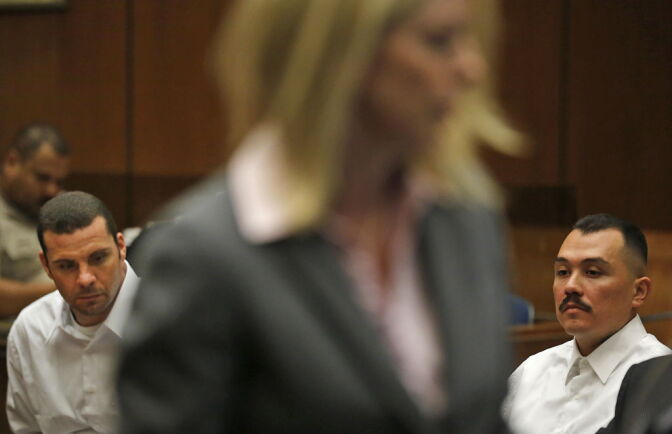 LOS ANGELES, CA - JUNE 6: LA County Deputy District Attorney Michele Hanisee (C), presents evidence against defendants Louie Sanchez (R) and Marvin Norwood (L) as they sit in the Los Angeles Superior Court during their preliminary hearing on June 6, 2012 in Los Angeles, California. Marvin Norwood and fellow defendant Louie Sanchez are accused of brutally beating San Francisco Giants fan Bryan Stow in the parking lot of Dodger Stadium on opening day in 2011. (Photo by Brian van der Brug-Pool/Getty Images)