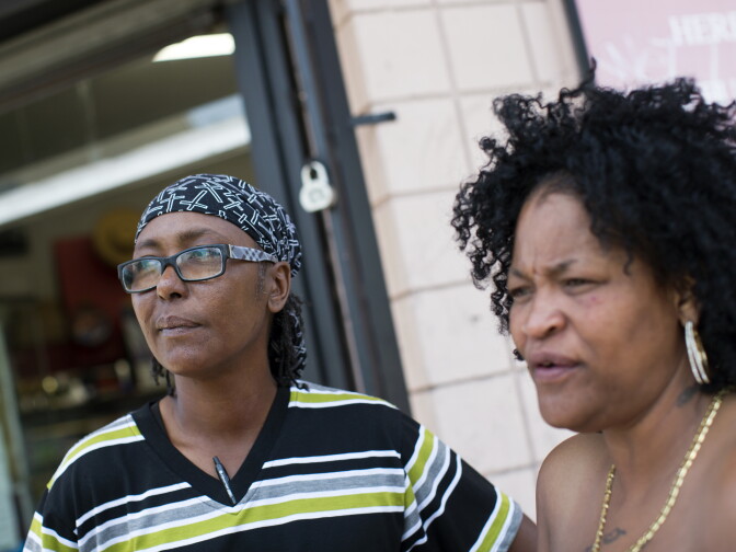 Mary Whitmore, left, and her fiancé, Shandelyn Rhodes shop at their local Food for Less. They sometimes travel outside of neighborhood for specialty groceries. Whitmore and Rhodes do a lot of home cooking.