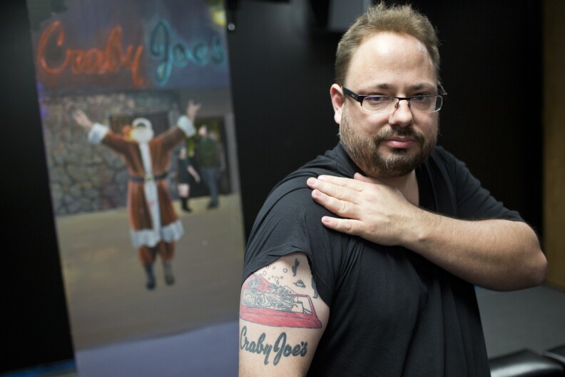 Jeremy Hansen is the founder of Skidrow Studios. Hansen has a tattoo and painting in the studio of Craby Joe's, a neighborhood bar that closed in 2007.