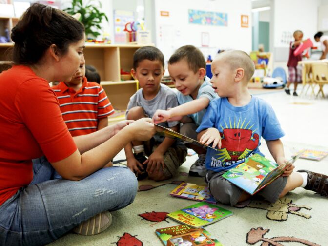 A teacher at LAUP Preschool "Un Mundo de Amigos" in the City of Long Beach, practices “serve and return," an interactive method with toddlers that is critical for brain development.